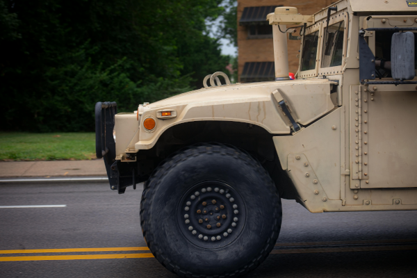 On Campus, Grenade Launchers, M-16s, and Armored Vehicles